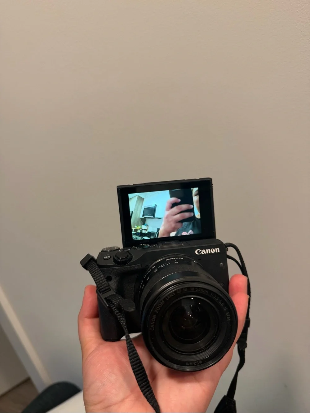 Canon Black Mirrorless Camera with 18-55mm Zoom Lens